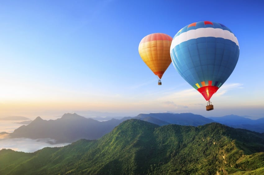 SUMMARY Ballooning as a company trip. Over the world in a hot-air balloon